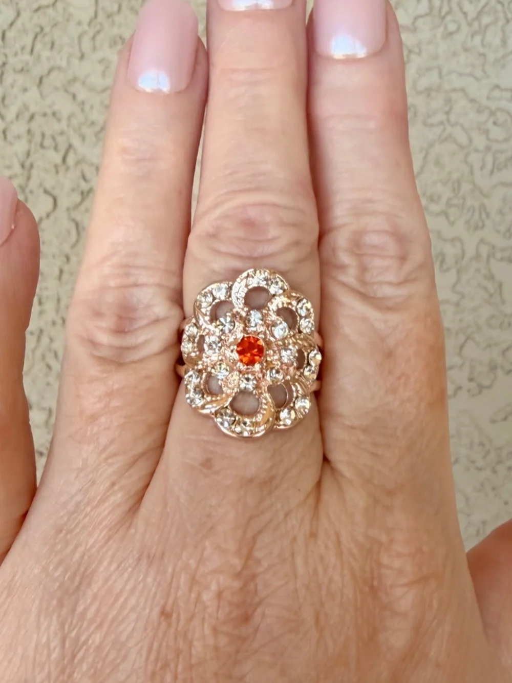 Intricate Rose Gold Floral Statement Ring with Orange Center Stone
